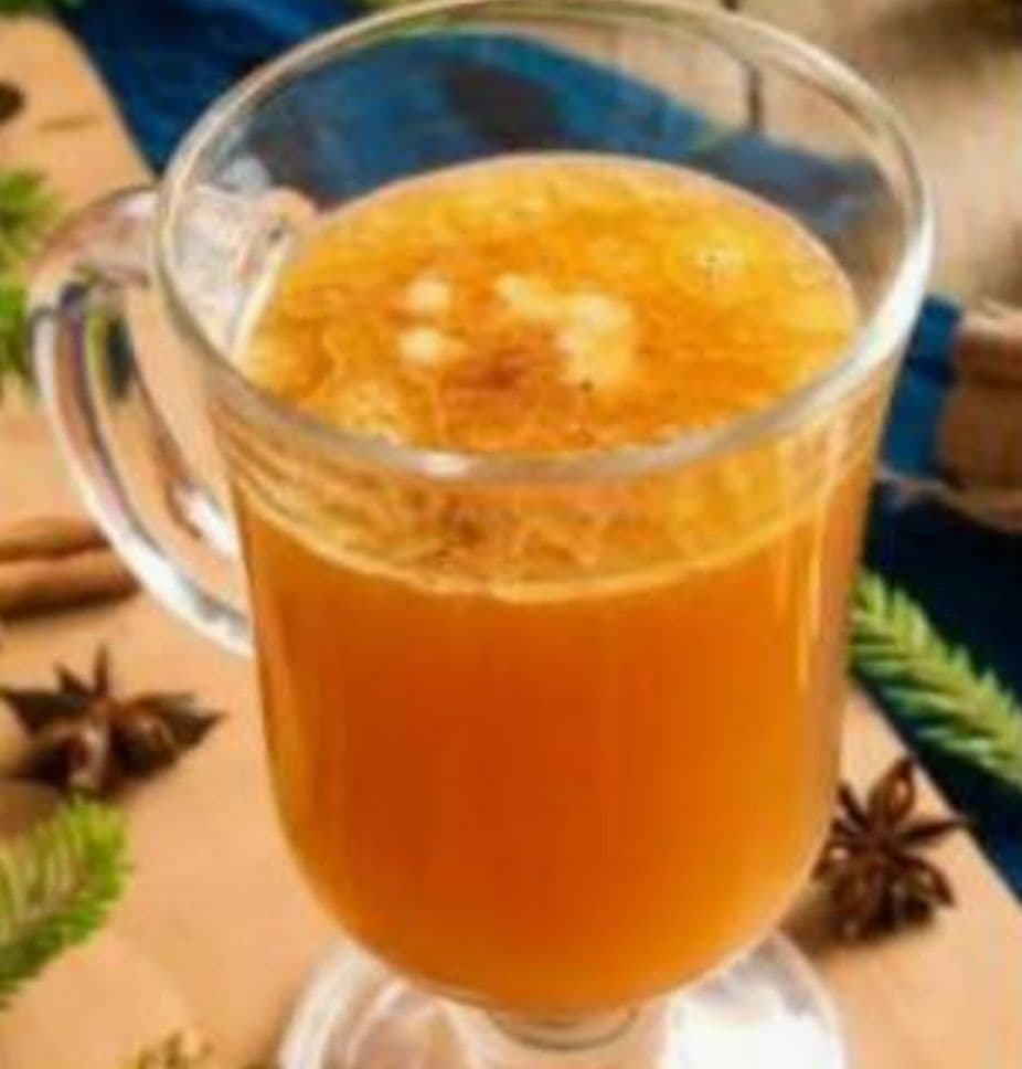 Best hot buttered pineapple cocktail in glass in Saint Paul